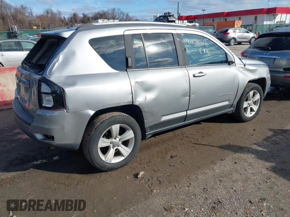 2016 Jeep Compass Latitude with VIN 1C4NJDEB5GD713905, listed as a IAAI auction lot 41138023 with 107,479 mi miles and . Bid and sale history available at DreamBid. Image 4.