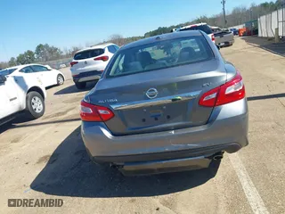 2017 Nissan Altima 2.5 SV with VIN 1N4AL3AP4HC136995, listed as a IAAI auction lot 41580400 with 92,799 mi miles. Bid and sale history available at carsss.com. Image 16.