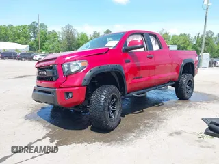 2017 Toyota Tundra SR z VIN 5TFUY5F10HX677527, wystawiony jako IAAI lot #42157357 z przebiegiem 43 111 mil mil oraz . Historia ofert i sprzedaży dostępna na DreamBid. Obrazek 17.