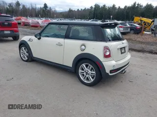 2011 MINI Hardtop S with VIN WMWSV3C58BTY22854, listed as a IAAI auction lot 42034126 with 98,931 mi miles and . Bid and sale history available at DreamBid. Image 3.