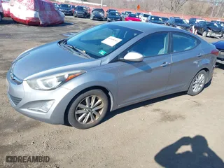 2014 Hyundai Elantra SE with VIN KMHDH4AEXEU049424, listed as a IAAI auction lot 41858569 with 77,496 mi miles. Bid and sale history available at carsss.com. Image 2.