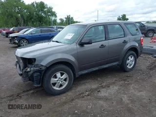 2011 Ford Escape XLS with VIN 1FMCU9C73BKC51595, listed as a IAAI auction lot 42266748 with 204,043 mi miles and . Bid and sale history available at DreamBid. Image 2.