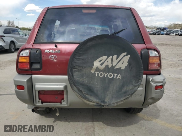 2000 Toyota RAV4 z VIN JT3HP10V2Y7162705, wystawiony jako Copart lot #54268515 z przebiegiem 310 778 mil mil oraz Czysty tytuł • Clean title. Historia ofert i sprzedaży dostępna na DreamBid. Obrazek 6.