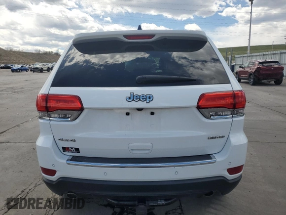 2014 Jeep Grand Cherokee Limited z VIN 1C4RJFBG5EC545425, wystawiony jako Copart lot #54035445 z przebiegiem 135 309 mil mil oraz Szkoda całkowita • Salvage title. Historia ofert i sprzedaży dostępna na DreamBid. Obrazek 6.