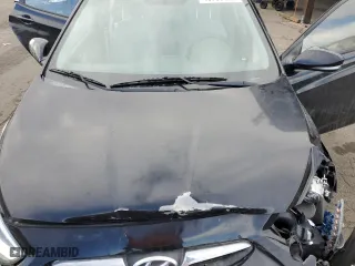2014 Hyundai Accent SE with VIN KMHCU5AEXEU165364, listed as a Copart auction lot 46703125 with 73,312 mi miles and Salvage Title. Bid and sale history available at carsss.com. Image 12.