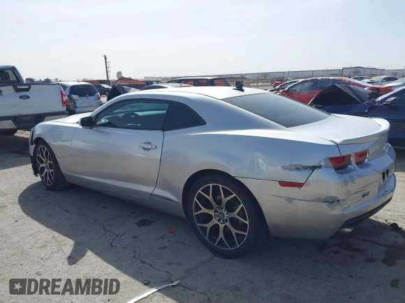 2013 Chevrolet Camaro LS с VIN 2G1FA1E32D9131600, выставлен на аукционе IAAI как лот 41742765 с пробегом 184 660 миль миль и . История ставок и продаж доступна на DreamBid. Изображение 3.