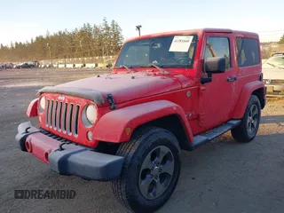 2018 Jeep Wrangler Sahara z VIN 1C4AJWBG2JL936412, wystawiony jako IAAI lot #41381668 z przebiegiem 82 535 mil mil oraz . Historia ofert i sprzedaży dostępna na DreamBid. Obrazek 2.