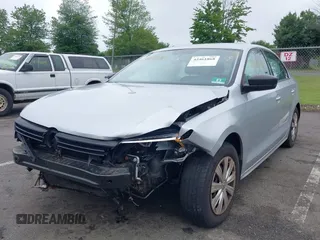 2014 Volkswagen Jetta S z VIN 3VW2K7AJ7EM217758, wystawiony jako IAAI lot #42461868 z przebiegiem 141 962 mil mil oraz . Historia ofert i sprzedaży dostępna na DreamBid. Obrazek 17.