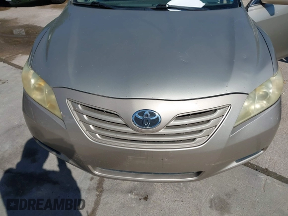 2009 Toyota Camry with VIN 4T1BE46K09U854188, listed as a IAAI auction lot 41973199 with 210,924 mi miles. Bid and sale history available at carsss.com. Image 6.