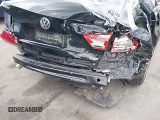 2013 Volkswagen Passat SE with VIN 1VWBP7A34DC114543, listed as a IAAI auction lot 42464549 with 111,146 mi miles and . Bid and sale history available at DreamBid. Image 6.