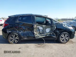 2015 Honda Fit EX-L z VIN 3HGGK5H81FM705199, wystawiony jako IAAI lot #42310099 z przebiegiem Nie podano mil oraz . Historia ofert i sprzedaży dostępna na DreamBid. Obrazek 13.