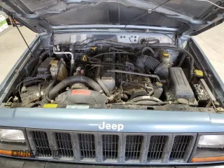 1997 Jeep Cherokee Sport with VIN 1J4FJ68S4VL532609, listed as a Copart auction lot 46711285 with 273,930 mi miles and Salvage Title. Bid and sale history available at carsss.com. Image 13.