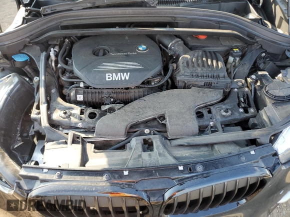 2018 BMW X1 xDrive28i with VIN WBXHT3C33J5F90612, listed as a Copart auction lot 74937654 with 72,561 mi miles and Salvage Title. Bid and sale history available at carsss.com. Image 12.
