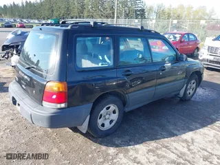 1999 Subaru Forester L with VIN JF1SF6351XH716957, listed as a IAAI auction lot 41969521 with 253,696 mi miles. Bid and sale history available at carsss.com. Image 4.