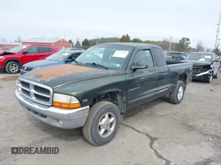 1997 Dodge Dakota with VIN 1B7GG23X1VS211394, listed as a IAAI auction lot 41723088 with 124,104 mi miles. Bid and sale history available at carsss.com. Image 2.