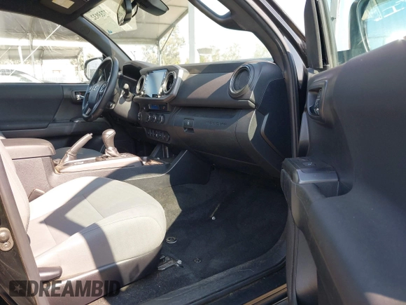 2022 Toyota Tacoma SR5 with VIN 3TMBZ5DN6NM034630, listed as a IAAI auction lot 42733932 with 43,309 mi miles and . Bid and sale history available at DreamBid. Image 5.