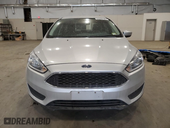 2018 Ford Focus SE z VIN 1FADP3F24JL315154, wystawiony jako Copart lot #53609185 z przebiegiem 76 216 mil mil oraz Szkoda całkowita • Salvage title. Historia ofert i sprzedaży dostępna na DreamBid. Obrazek 5.