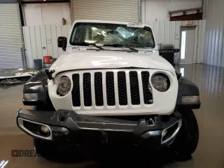2023 Jeep Gladiator Sport S z VIN 1C6HJTAG0PL523306, wystawiony jako Copart lot #59236535 z przebiegiem 64 185 mil mil oraz Szkoda całkowita • Salvage title. Historia ofert i sprzedaży dostępna na DreamBid. Obrazek 5.