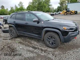 2019 Jeep Cherokee Trailhawk with VIN 1C4PJMBX4KD121641, listed as a Copart auction lot 57128905 with 129,206 mi miles and Salvage title. Bid and sale history available at DreamBid. Image 4.