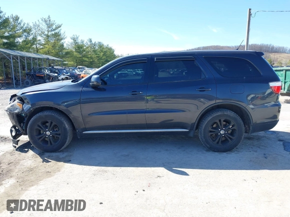 2013 Dodge Durango SXT with VIN 1C4RDJAG2DC530407, listed as a IAAI auction lot 41837441 with 133,375 mi miles and . Bid and sale history available at DreamBid. Image 14.