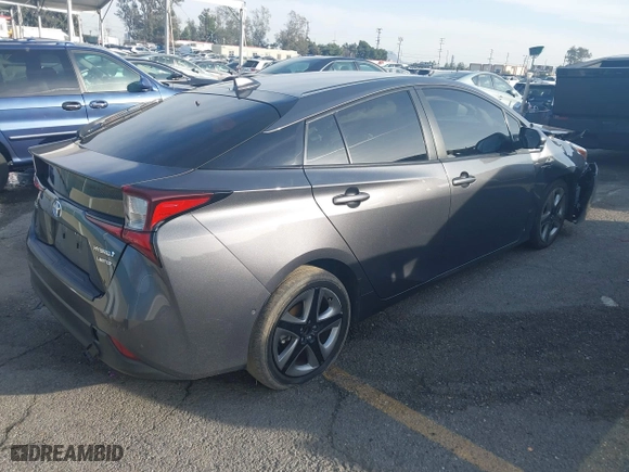 2022 Toyota Prius L Eco with VIN JTDKAMFU2N3168011, listed as a IAAI auction lot 41602356 with 34,977 mi miles. Bid and sale history available at carsss.com. Image 4.