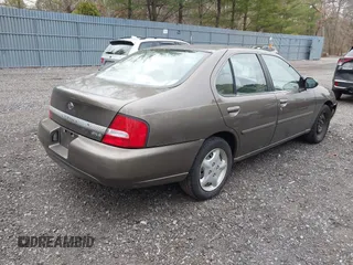 2000 Nissan Altima XE with VIN 1N4DL01D0YC181174, listed as a IAAI auction lot 41798721 with 119,682 mi miles. Bid and sale history available at carsss.com. Image 4.