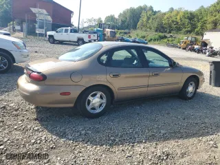1999 Ford Taurus SE with VIN 1FAFP53U3XG292185, listed as a Copart auction lot 69292984 with 54,965 mi miles and Clean Title. Bid and sale history available at carsss.com. Image 3.