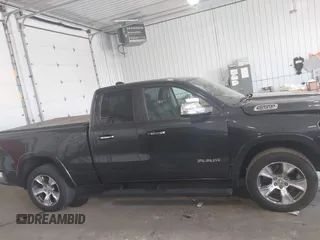 2020 Ram 1500 Laramie with VIN 1C6SRFDT7LN142009, listed as a IAAI auction lot 42330341 with 108,351 mi miles and . Bid and sale history available at DreamBid. Image 13.
