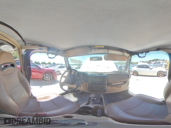 2001 Jeep Wrangler Sahara with VIN 1J4FA59S81P321490, listed as a Copart auction lot 57320005 with 180,959 mi miles and Salvage title. Bid and sale history available at DreamBid. Image 14.