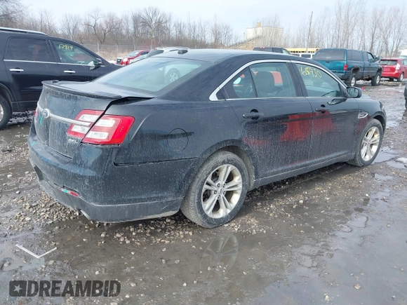 2013 Ford Taurus SEL with VIN 1FAHP2E86DG135835, listed as a IAAI auction lot 41665430 with 130,816 mi miles. Bid and sale history available at carsss.com. Image 4.