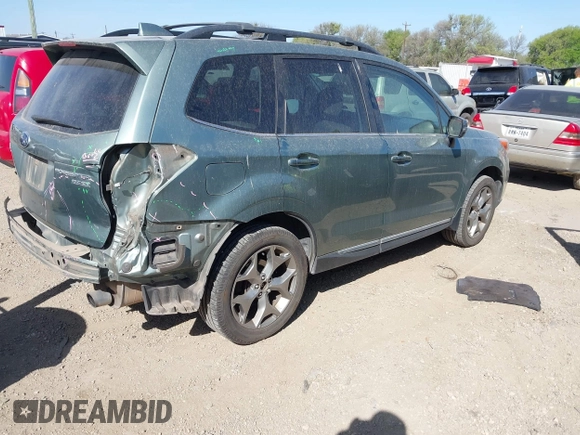 2016 Subaru Forester 2.5i Touring with VIN JF2SJAVC0GH460559, listed as a IAAI auction lot 41829487 with 115,855 mi miles. Bid and sale history available at carsss.com. Image 4.