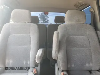 2003 Kia Sedona LX with VIN KNDUP131236411909, listed as a Copart auction lot 73715384 with 179,642 mi miles and Salvage Title. Bid and sale history available at carsss.com. Image 10.