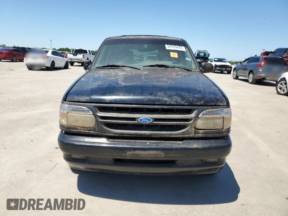 1997 Ford Explorer XLT with VIN 1FMDU35P5VZB51640, listed as a Copart auction lot 52030474 with 214,647 mi miles and Clean title. Bid and sale history available at DreamBid. Image 5.