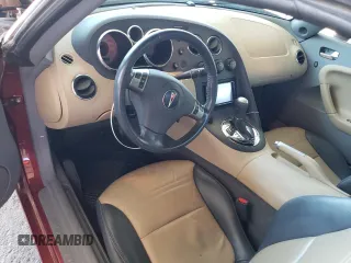 2007 Pontiac Solstice z VIN 1G2MB35B27Y112029, wystawiony jako Copart lot #57658225 z przebiegiem 39 130 mil mil oraz Szkoda całkowita • Salvage title. Historia ofert i sprzedaży dostępna na DreamBid. Obrazek 8.