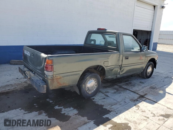 1994 Isuzu Pickup S z VIN JAACL11L2R7221226, wystawiony jako Copart lot #59027295 z przebiegiem 129 494 mil mil oraz Tytuł czysty. Historia ofert i sprzedaży dostępna na DreamBid. Obrazek 3.