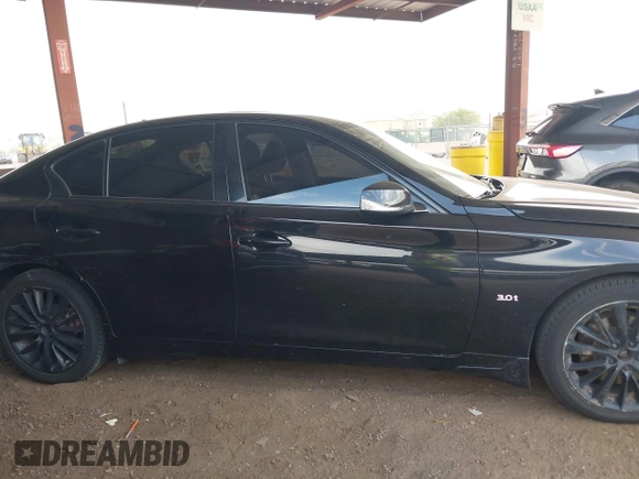 2019 Infiniti Q50 Luxe with VIN JN1EV7ARXKM593846, listed as a IAAI auction lot 42773548 with 57,165 mi miles and . Bid and sale history available at DreamBid. Image 13.