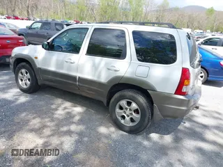 2001 Mazda Tribute LX with VIN 4F2YU09131KM12857, listed as a IAAI auction lot 42034605 with 257,015 mi miles and . Bid and sale history available at carsss.com. Image 3.