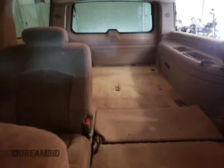 2002 Chevrolet Suburban LS with VIN 1GNFK16Z12J326815, listed as a Copart auction lot 63348745 with 296,618 mi miles and Salvage title. Bid and sale history available at DreamBid. Image 10.