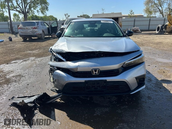 2022 Honda Civic Sport with VIN 2HGFE2F52NH598767, listed as a Copart auction lot 52771165 with 52,463 mi miles and Non Repairable. Bid and sale history available at carsss.com. Image 5.