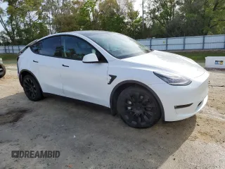 2022 Tesla Model Y Long Range with VIN 7SAYGDEE4NF398710, listed as a Copart auction lot 50510375 with 46,430 mi miles and Non Repairable. Bid and sale history available at DreamBid. Image 4.