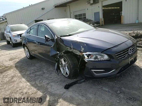 2015 Volvo S60 T5 Drive-E Premier z VIN YV140MFK7F2355529, wystawiony jako Copart lot #48684345 z przebiegiem 159 545 mil mil oraz Szkoda całkowita • Salvage title. Historia ofert i sprzedaży dostępna na DreamBid. Obrazek 13.