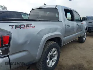 2023 Toyota Tacoma SR z VIN 3TMCZ5AN0PM538974, wystawiony jako IAAI lot #42510020 z przebiegiem 31 281 mil mil oraz . Historia ofert i sprzedaży dostępna na DreamBid. Obrazek 17.