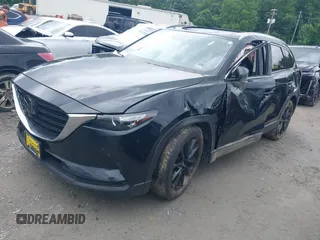 2022 Mazda CX-9 Touring Plus z VIN JM3TCBAY2N0619279, wystawiony jako IAAI lot #42373722 z przebiegiem 43 540 mil mil oraz . Historia ofert i sprzedaży dostępna na DreamBid. Obrazek 17.