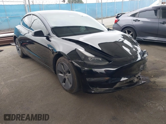 2023 Tesla Model 3 with VIN 5YJ3E1EA7PF473749, listed as a IAAI auction lot 41921478 with 21,483 mi miles and . Bid and sale history available at DreamBid. Image 1.