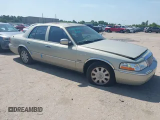 2005 Mercury Grand Marquis LS Premium z VIN 2MEFM75W85X637956, wystawiony jako IAAI lot #42229286 z przebiegiem 114 385 mil mil oraz . Historia ofert i sprzedaży dostępna na DreamBid. Obrazek 1.