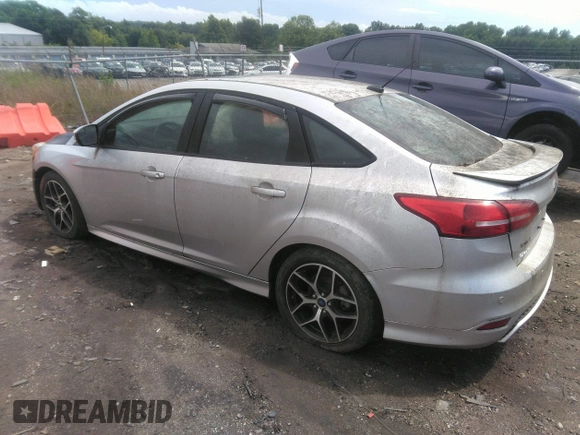 2015 Ford Focus SE with VIN 1FADP3F2XFL345234, listed as a IAAI auction lot 42402207 with Not provided miles and . Bid and sale history available at DreamBid. Image 3.