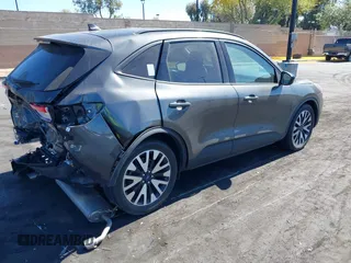 2020 Ford Escape SE Sport Hybrid with VIN 1FMCU0BZ0LUC38338, listed as a IAAI auction lot 42496540 with 36,766 mi miles and . Bid and sale history available at DreamBid. Image 4.