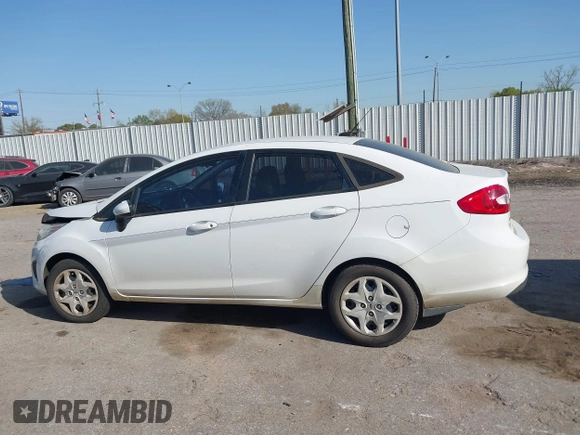 2012 Ford Fiesta SE with VIN 3FADP4BJ0CM207764, listed as a IAAI auction lot 41852699 with 143,287 mi miles. Bid and sale history available at carsss.com. Image 14.