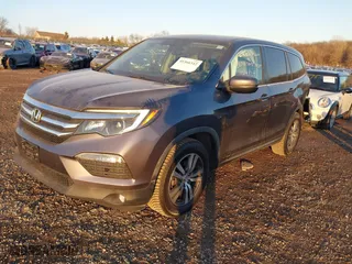2017 Honda Pilot EX-L with VIN 5FNYF5H56HB020703, listed as a IAAI auction lot 41366342 with 96,618 mi miles. Bid and sale history available at carsss.com. Image 17.