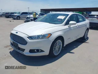 2014 Ford Fusion SE Hybrid with VIN 3FA6P0LUXER233658, listed as a IAAI auction lot 42311588 with 106,282 mi miles and . Bid and sale history available at DreamBid. Image 17.